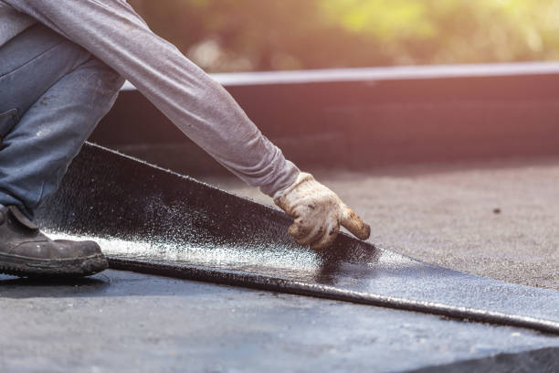 Professional Waterproofing technician working in Mount Holly, NC